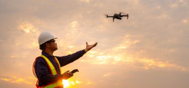 construction worker with a drone